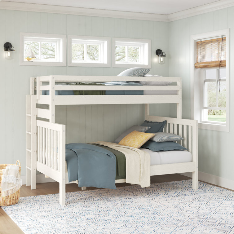 White twin over full bunk bed with top storage